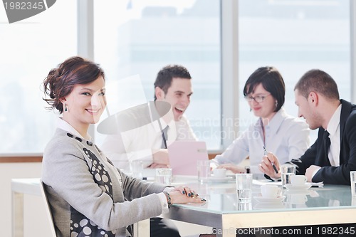 Image of group of business people at meeting