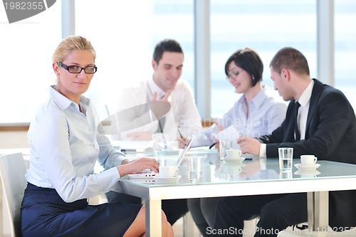 Image of group of business people at meeting