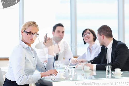 Image of group of business people at meeting