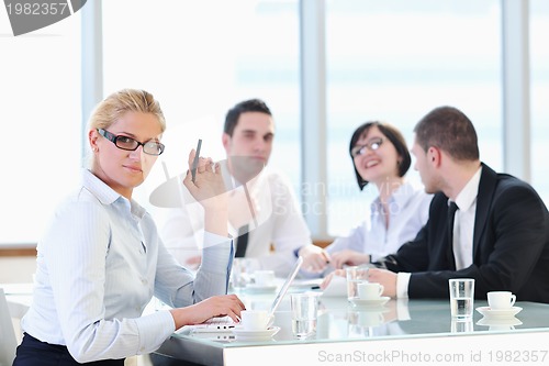 Image of group of business people at meeting