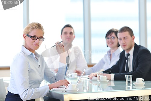 Image of group of business people at meeting