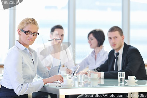 Image of group of business people at meeting