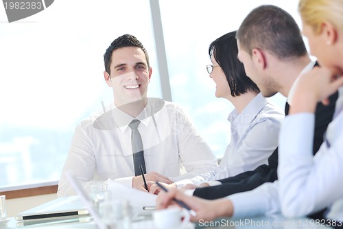 Image of group of business people at meeting