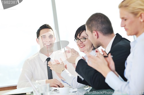 Image of group of business people at meeting