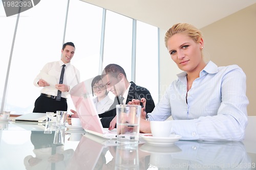 Image of group of business people at meeting