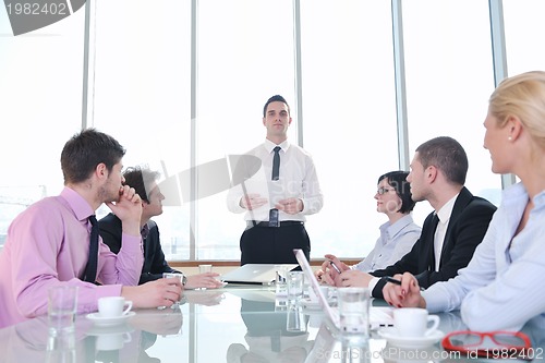 Image of group of business people at meeting