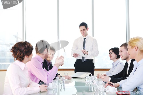 Image of group of business people at meeting