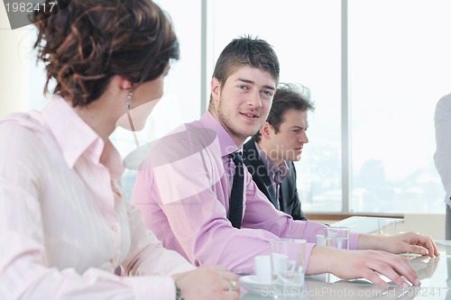 Image of group of business people at meeting