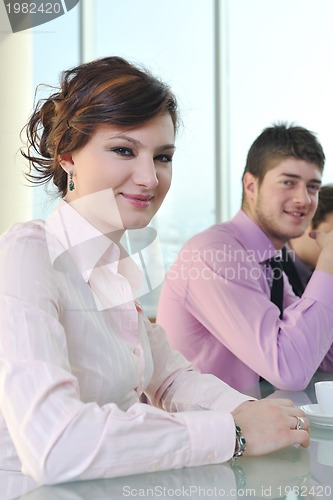 Image of group of business people at meeting