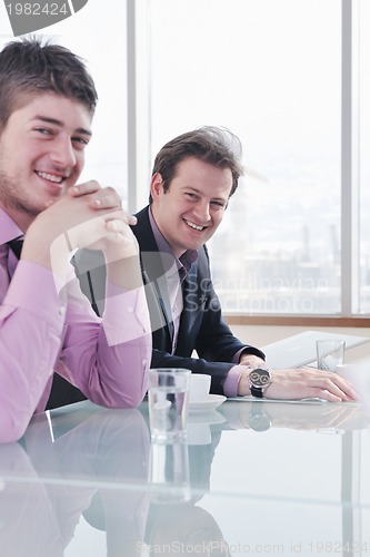 Image of group of business people at meeting