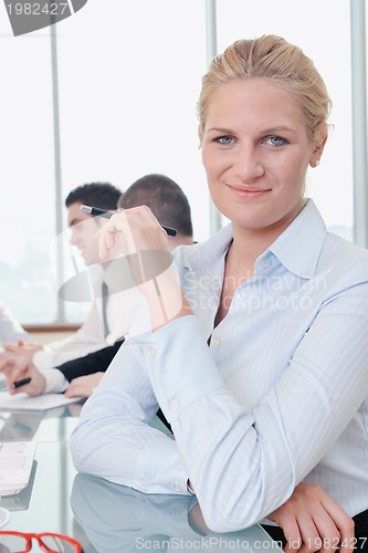 Image of group of business people at meeting