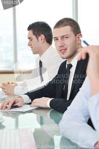 Image of group of business people at meeting