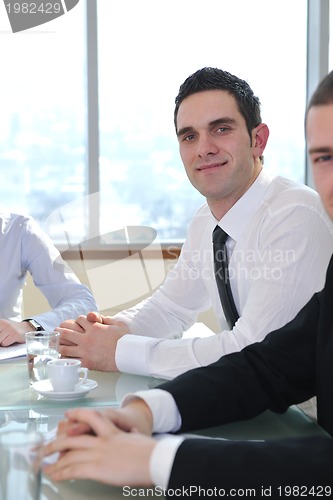 Image of group of business people at meeting