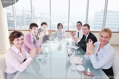 Image of group of business people at meeting