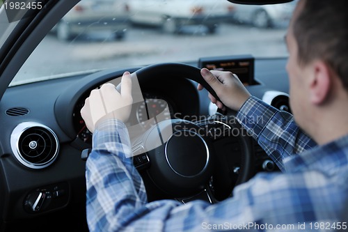 Image of man using car navigation