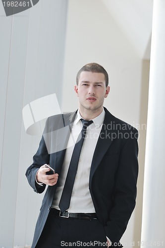 Image of young business man talk by cellphone