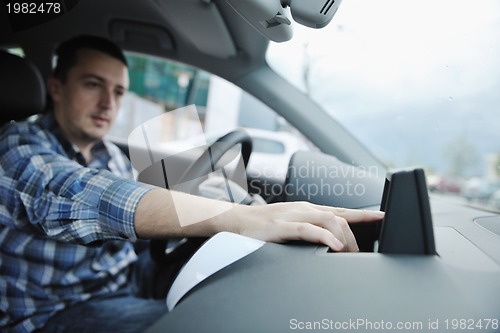 Image of man using car navigation