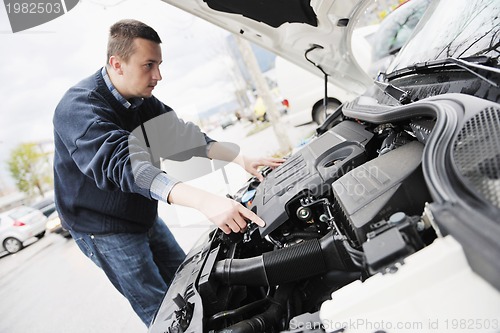 Image of man car repair