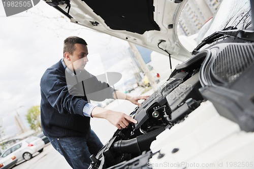 Image of man car repair