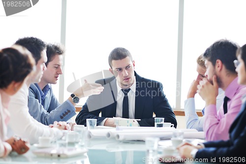 Image of group of business people at meeting