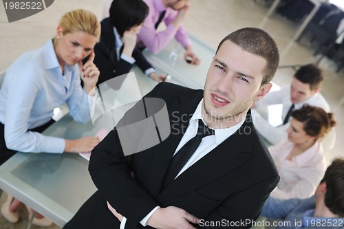 Image of group of business people at meeting