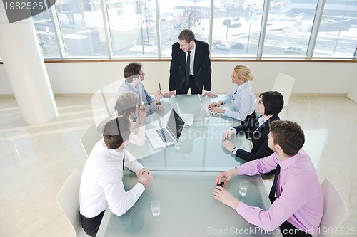 Image of group of business people at meeting