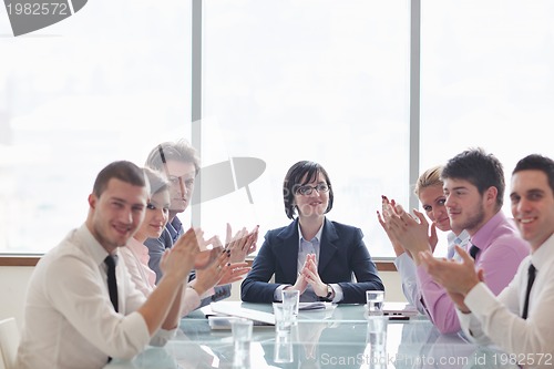 Image of group of business people at meeting