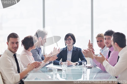 Image of group of business people at meeting