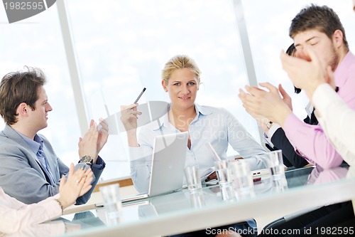 Image of group of business people at meeting