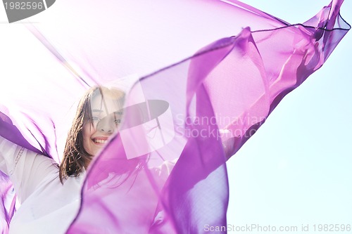 Image of young woman relax  on beach