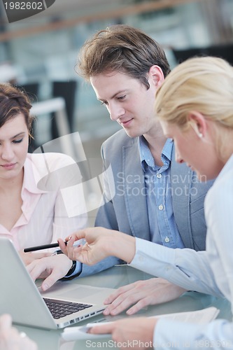 Image of group of business people at meeting