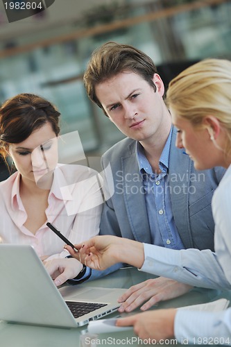 Image of group of business people at meeting