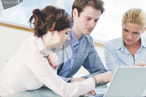 Image of group of business people at meeting