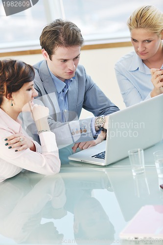 Image of group of business people at meeting