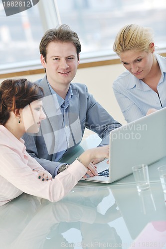 Image of group of business people at meeting