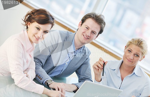 Image of group of business people at meeting