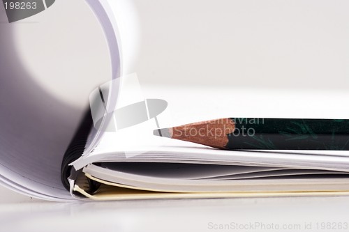 Image of Pencil and note book