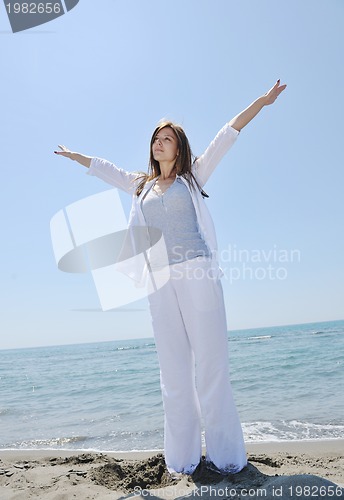 Image of young woman relax  on beach