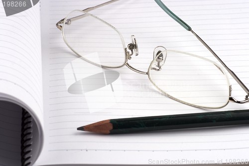 Image of Pencil and note book