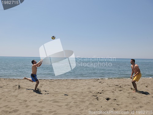 Image of male beach volleyball game player