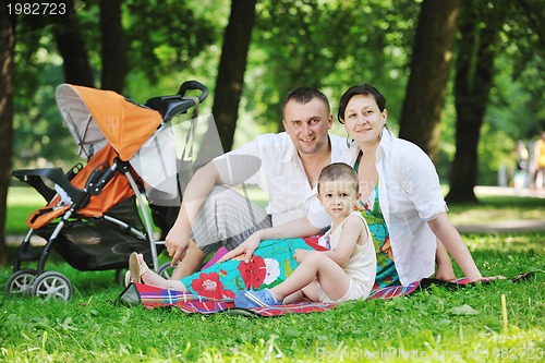 Image of Family at park relaxing and have fun