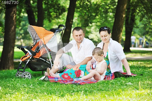 Image of Family at park relaxing and have fun