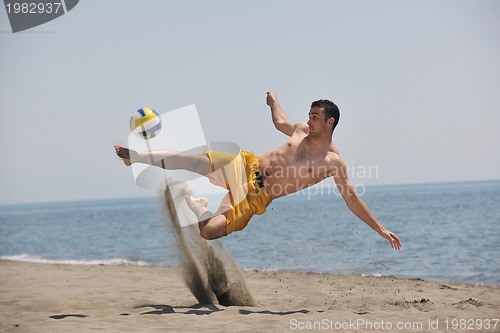 Image of male beach volleyball game player