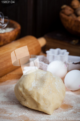 Image of Raw dough with baking ingredients