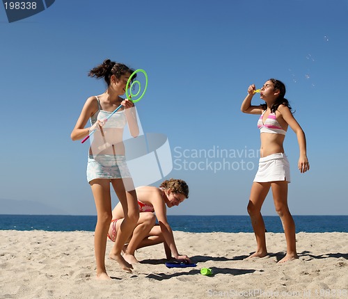 Image of Girls playing on the beach