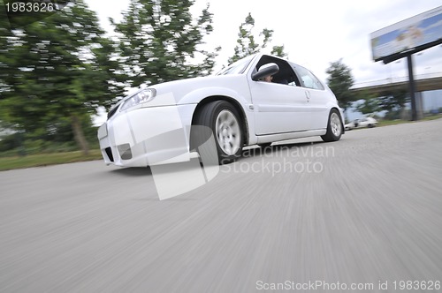 Image of Fast car moving with motion blur