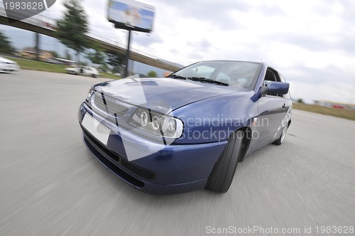 Image of Fast car moving with motion blur