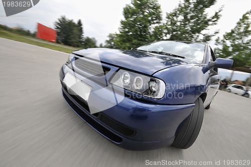 Image of Fast car moving with motion blur