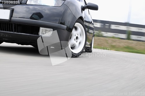 Image of Fast car moving with motion blur