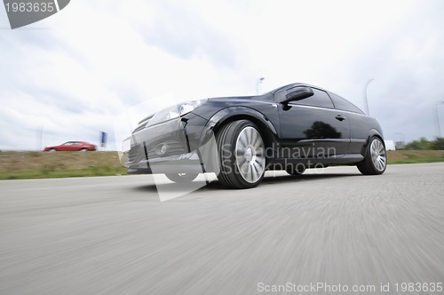 Image of Fast car moving with motion blur